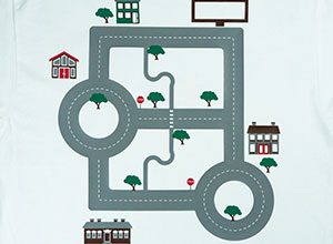 Image depicting the downloadable cut file that has a street and houses to make a car shirt