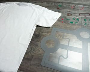A plaid white shirt laid out with the cut ThermoFlex Plus read to be pressed