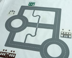 The first press showing some houses in the middle of being formed and the streets laid out