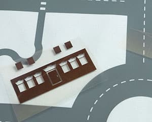 A close up of an unpressed house and street