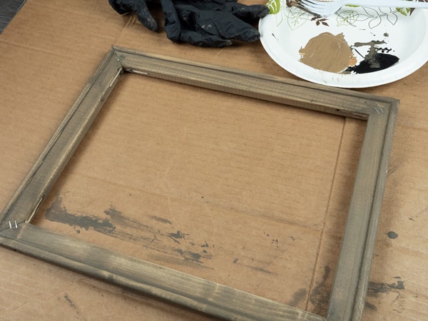 Showing the frame after the first layer of stain