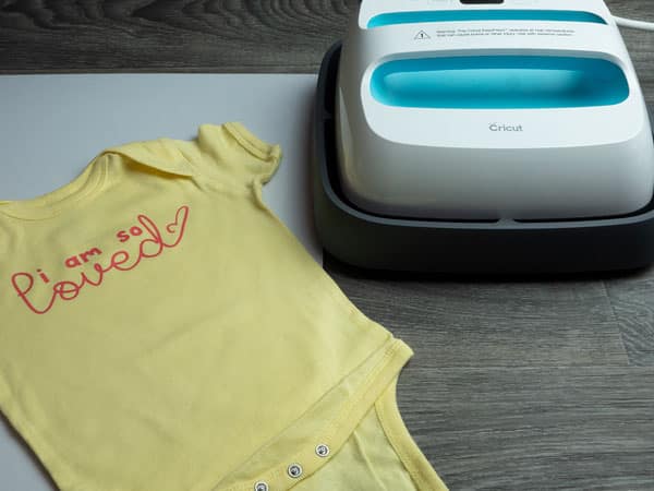 The finished onesie pictured with the EasyPress