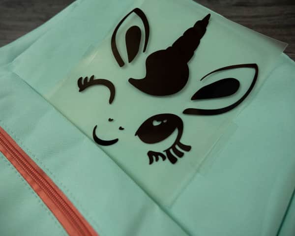 The base layer before being pressed on the unicorn face design