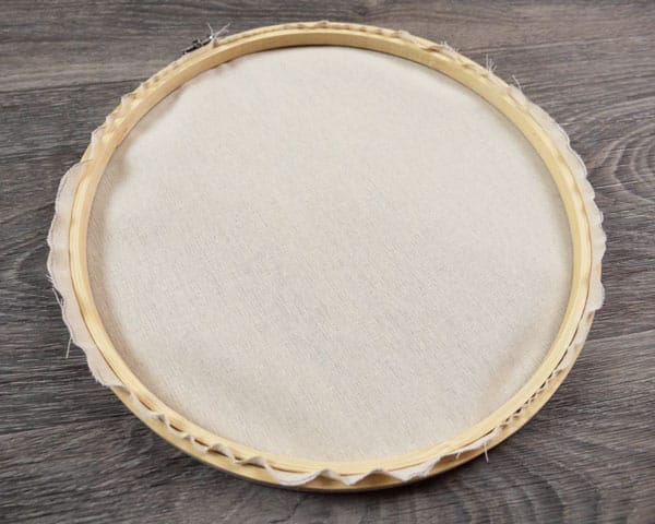 Making sure the hoop and the cloth work well together and it's not too short