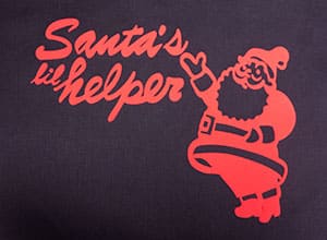 Shows the available cut file which has Santa pointing to the words "Santa's Lil Helper"