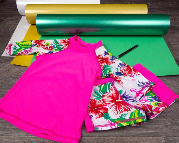 All the materials needed for the project- a nylon swim suit, ThermoFlex® Turbo, and PearlFlex