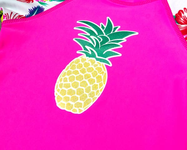 A closeup of the swim top finished with PearlFlex pressed on top of ThermoFlex® Turbo