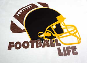 Image depicting the downloadable cut file that says "Football Life" with a handdrawn helmet and football