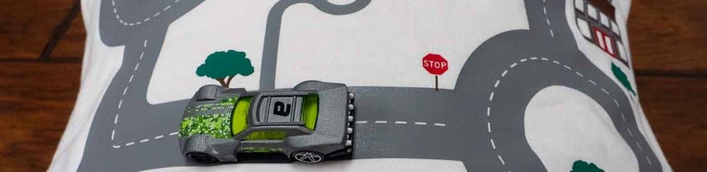 The finished shirt with a car on the back showing how the shirt can be used